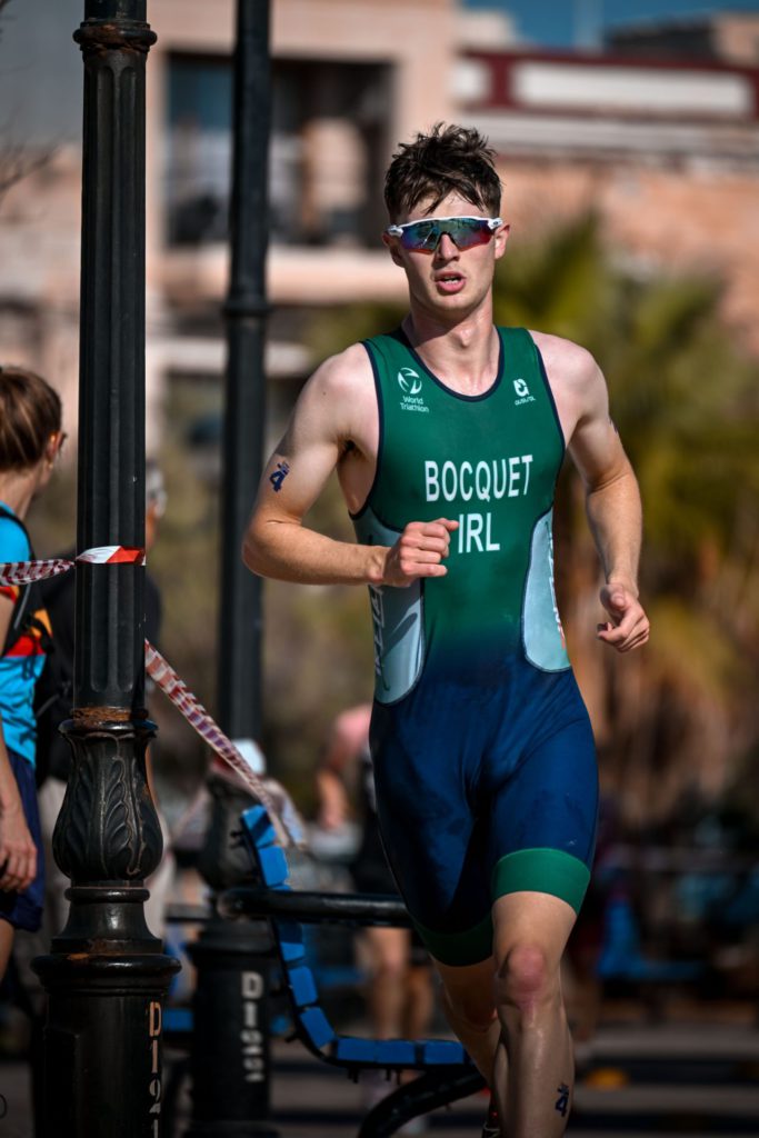 Mathys Bocquet running in Team Ireland triathlon suit