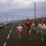 Maurice Mullins running with family