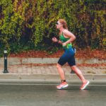 Tri Team Ireland female triathlete racing on road