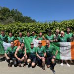 Tri Team Ireland - a group of triathletes posing for a photograph with the Irish flag