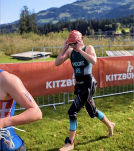Youth Triathlon Commission Members 2026 - Female triathlete emerging from water