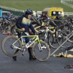 Man puttingf bike on rack Galco Naas Duathlon