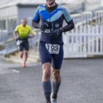 Man in grey socks and tri suit Runner at Galco Naas Duathlon