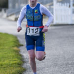 Girl in carlow tri suit running at Galco Naas Duathlon
