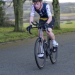 Cyclist going up hill at duathlon