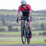 Cyclist going up hill at duathlon