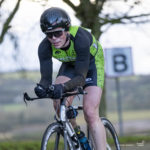Cyclist going up hill at duathlon