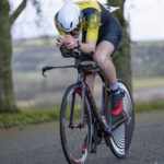 Cyclist going up hill at duathlon