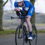 Cyclist going up hill at duathlon