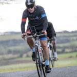 Cyclist going up hill at duathlon
