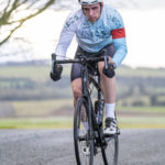 Cyclist going up hill at duathlon