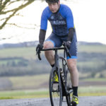 Cyclist going up hill at duathlon