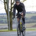 Cyclist going up hill at duathlon