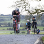 Cyclists going up hill at duathlon