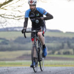 Cyclist going up hill at duathlon