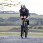 Cyclist going up hill at duathlon
