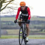 Cyclist going up hill at duathlon