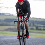 Cyclist going up hill at duathlon