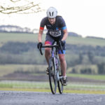 Cyclist going up hill at duathlon