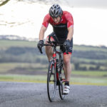 Cyclist going up hill at duathlon