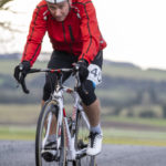 Cyclist going up hill at duathlon