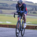 Cyclist going up hill at duathlon