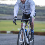 Cyclist going up hill at duathlon