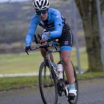 Cyclist going up hill at duathlon