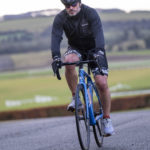 Cyclist going up hill at duathlon