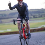 Cyclist going up hill at duathlon