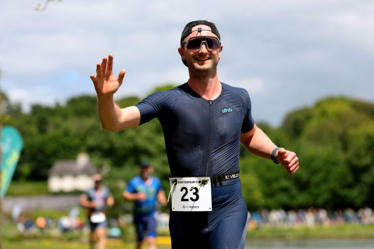 runner in blue Beyond the Wall Triathlon 2026