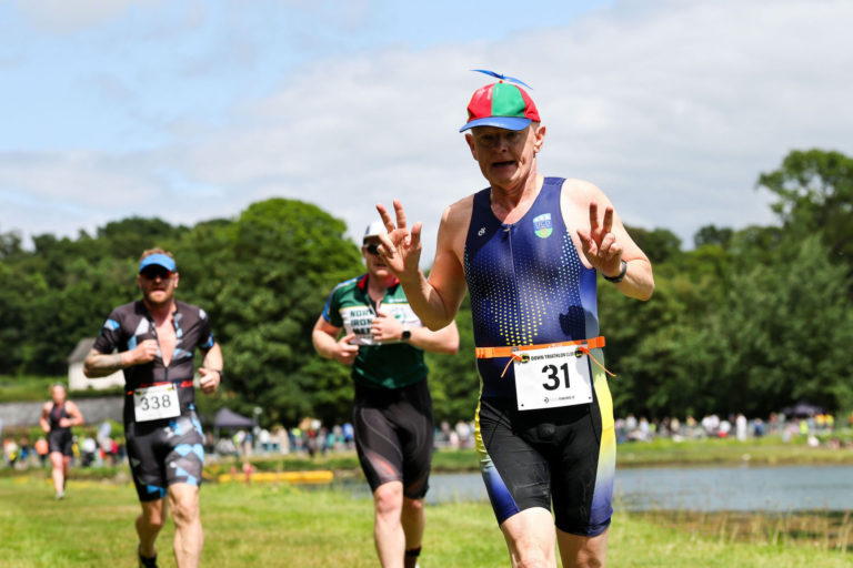 runner with funny hat Beyond the Wall Triathlon 2026