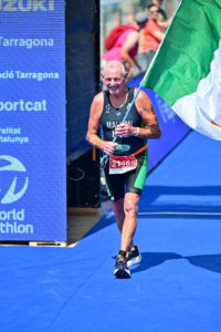 Tri-Team Ireland Mallon Athlete holding flag