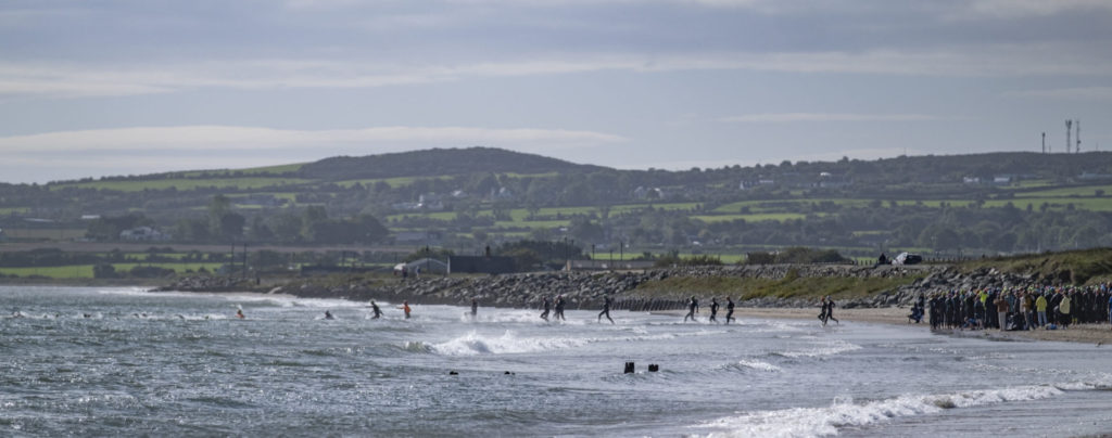 Triathletes at beach